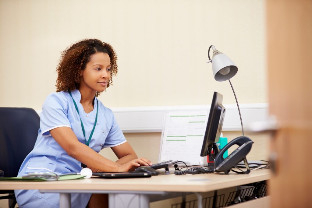 Female Health Care Provider Attending a Virtual Meeting
